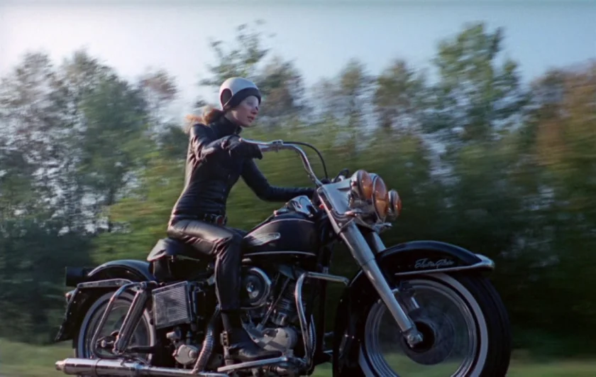 The girl on a motorcycle